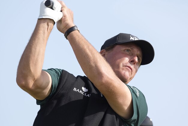 Jul 14, 2016; Troon,  Ayrshire, SCT; Phil Mickelson (USA) tees off on the 13th during the first round round of the 145th Open Championship golf tournament at Royal Troon Golf Club - Old Course. Mandatory Credit: Ian Rutherford-USA TODAY Sports