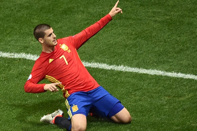 Spain's forward Alvaro Morata celebrates after scoring the 1-0 during the Euro 2016 group D football match between Spain and Turkey at the Allianz Riviera stadium in Nice on June 17, 2016. / AFP / BERTRAND LANGLOIS        (Photo credit should read BERTRAND LANGLOIS/AFP/Getty Images)
