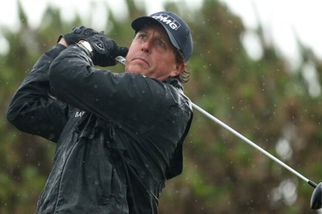 Phil Mickelson of the United States play his tee shot at the 13 thduring the second round of the British Open Golf Championship at the Royal Troon Golf Club in Troon, Scotland, Friday, July 15, 2016. (AP Photo/Peter Morrison)
