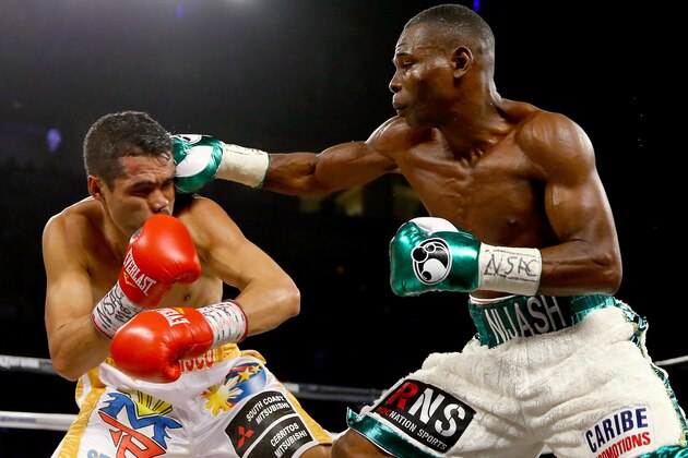 LAS VEGAS, NV - NOVEMBER 21:  (R-L) Guillermo Rigondeaux throws a right to the face of Drian Francisco during their junior featherweight bout at the Mandalay Bay Events Center on November 21, 2015 in Las Vegas, Nevada.  (Photo by Al Bello/Getty Images)