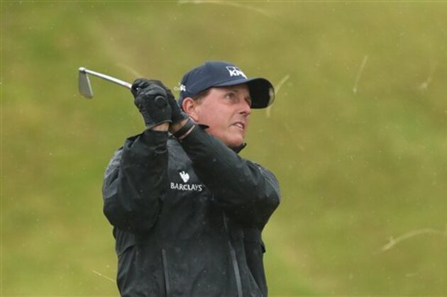 Phil Mickelson of the United States plays a shot on the 14th fairway during the second round of the British Open Golf Championships at the Royal Troon Golf Club in Troon, Scotland, Friday, July 15, 2016. (AP Photo/Peter Morrison)