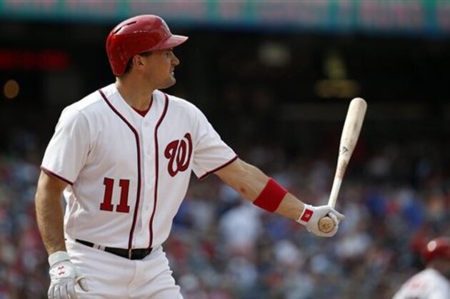 Washington Nationals first baseman Ryan Zimmerman (11) bats during a baseball game against the Chicago Cubs at Nationals Park, Wednesday, June 15, 2016, in Washington. (AP Photo/Alex Brandon)
