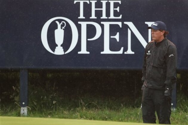 Phil Mickelson of the United States looks at his chip onto the 9th green during the second round of the British Open Golf Championships at the Royal Troon Golf Club in Troon, Scotland, Friday, July 15, 2016. (AP Photo/Peter Morrison)
