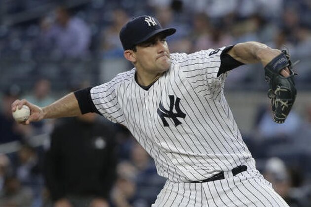 New York Yankees pitcher Nathan Eovaldi delivers against the Toronto Blue Jays during the first inning of a baseball game, Tuesday, May 24, 2016, in New York. (AP Photo/Julie Jacobson)