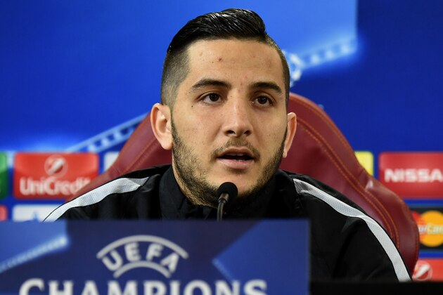 AS Roma's Greek defender Kostas Manolas attends a press conference on February 16, 2016 at Roma's training camp in Trigoria , in the outskirts of Rome, on the eve of the round of sixteen UEFA Champions League football match As Roma vs Real Madrid.  / AFP / ALBERTO PIZZOLI        (Photo credit should read ALBERTO PIZZOLI/AFP/Getty Images)