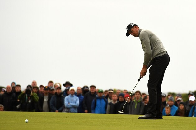 Sweden's Henrik Stenson putts on the 17th green during his third round on day three of the 2016 British Open Golf Championship at Royal Troon in Scotland on July 16, 2016. / AFP / Ben STANSALL / RESTRICTED TO EDITORIAL USE        (Photo credit should read BEN STANSALL/AFP/Getty Images)