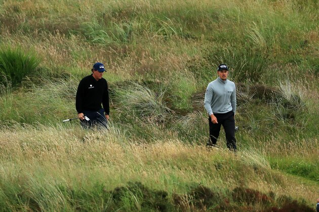 TROON, SCOTLAND - JULY 16:  Henrik Stenson of Sweden walks with Phil Mickelson of the United States during the third round on day three of the 145th Open Championship at Royal Troon on July 16, 2016 in Troon, Scotland.  (Photo by Mike Ehrmann/Getty Images)