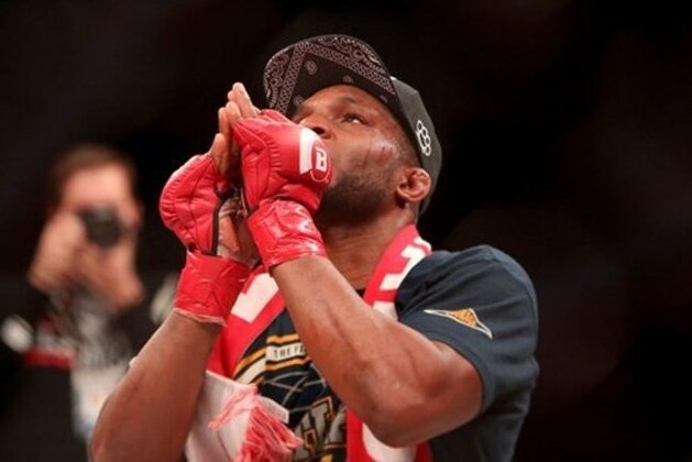 Paul Daley celebrates a win against Andre Santos during their fight at Bellator 134 on Friday, Feb. 27, 2015, in Uncasville, CT.  Daley won the fight via decision. (AP Photo/Gregory Payan)
