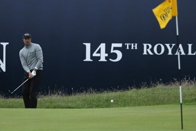 Henrik Stenson of Sweden chips onto the 18th green during the third round of the British Open Golf Championship at the Royal Troon Golf Club in Troon, Scotland, Saturday, July 16, 2016. (AP Photo/Ben Curtis)