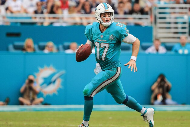 MIAMI GARDENS, FL - JANUARY 03:  Ryan Tannehill #17 of the Miami Dolphins in action during the second half of the game against the New England Patriots at Sun Life Stadium on January 3, 2016 in Miami Gardens, Florida.  (Photo by Mike Ehrmann/Getty Images)