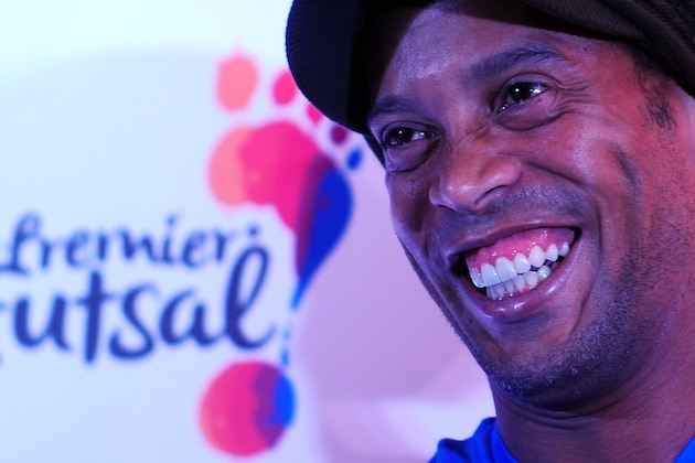 Former Brazilian footballer Ronaldhino attends a media briefing for the Premier Futsal Football League in Chennai on July 14, 2016. / AFP / ARUN SANKAR        (Photo credit should read ARUN SANKAR/AFP/Getty Images)
