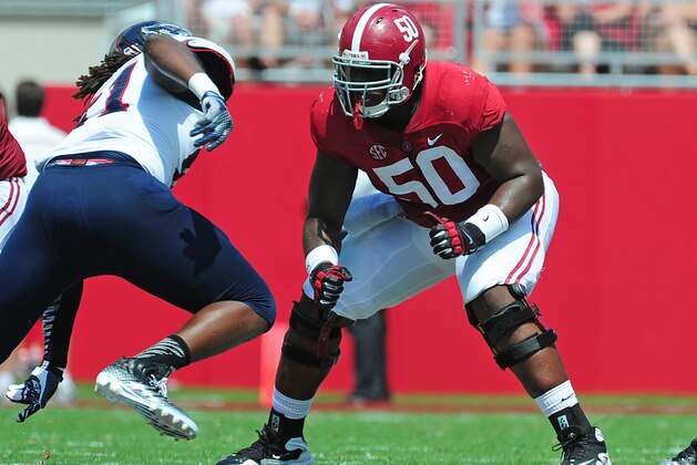 TUSCALOOSA, AL - SEPTEMBER 6: Alphonse Taylor #50 of the Alabama Crimson Tide defends against the Florida Atlantc Owls on September 6, 2014 at Bryant-Denny Stadium in Tuscaloosa, Alabama. (Photo by Scott Cunningham/Getty Images)