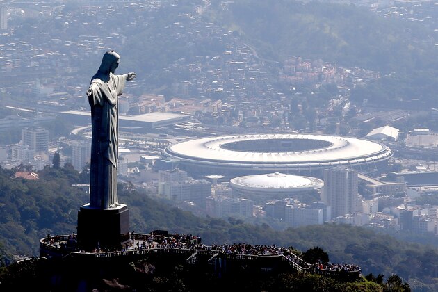 RIO DE JANEIRO, BRAZIL - JULY 04:  Aerial view of Christ the Redeemer with Maracana Stadium in the background  in preparation for the 2016 Olympic Games on July 4, 2016 in Rio de Janeiro, Brazil.  (Photo by Matthew Stockman/Getty Images)