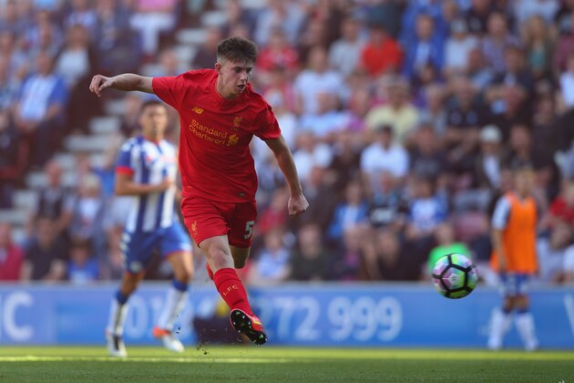 WIGAN, ENGLAND - JULY 17:  Ben Woodburn of Liverpool scores the second goal during a pre-season friendly between Wigan Athletic and Liverpool at JJB Stadium on July 17, 2016 in Wigan, England.  (Photo by Alex Livesey/Getty Images)