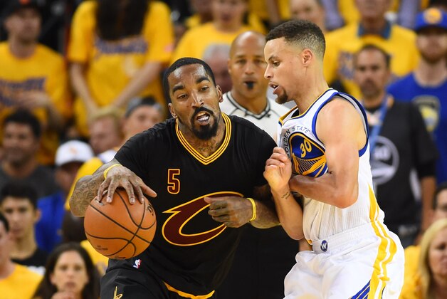 Jun 13, 2016; Oakland, CA, USA; Cleveland Cavaliers guard J.R. Smith (5) with the ball as Golden State Warriors guard Stephen Curry (30) defends in the third quarter in game five of the NBA Finals at Oracle Arena. Mandatory Credit: Bob Donnan-USA TODAY Sports