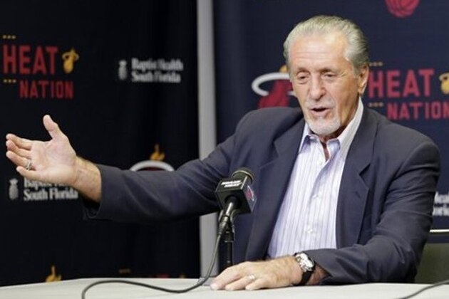 Miami Heat president Pat Riley gestures as he talks to reporters during a news conference, Thursday, July 9, 2015, in Miami. Goran Dragic has signed his five-year deal with the Miami Heat. (AP Photo/Alan Diaz)
