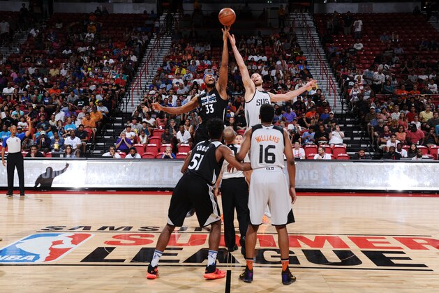 LAS VEGAS, NV - JULY 17:  The opening tip off between Adreian Payne #33 of the Minnesota Timberwolves and Alec Brown #10 of the Phoenix Suns during the 2016 NBA Las Vegas Summer League game on July 17, 2016 at the Thomas & Mack Center in Las Vegas, Nevada. NOTE TO USER: User expressly acknowledges and agrees that, by downloading and or using this photograph, User is consenting to the terms and conditions of the Getty Images License Agreement. Mandatory Copyright Notice: Copyright 2016 NBAE  (Photo by Garrett Ellwood/NBAE via Getty Images)