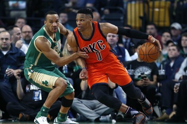 Oklahoma City Thunder's Russell Westbrook, right, drives past Boston Celtics' Avery Bradley, during the second quarter of an NBA basketball game in Boston, Wednesday, March 16, 2016. (AP Photo/Michael Dwyer)