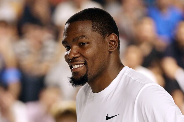 GUANGZHOU, CHINA - JULY 11:  American professional basketball NBA player Kevin Durant of the Golden State Warriors attends a commercial event for Nike at Tianhe Sports Center on July 11, 2016 in Guangzhou, China.  (Photo by Zhong Zhi/Getty Images)