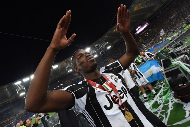 ROME, ITALY - MAY 21:  Paul Pogba of Juventus FC celebrates the victory after the TIM Cup match between AC Milan and Juventus FC at Stadio Olimpico on May 21, 2016 in Rome, Italy.  (Photo by Giuseppe Bellini/Getty Images)