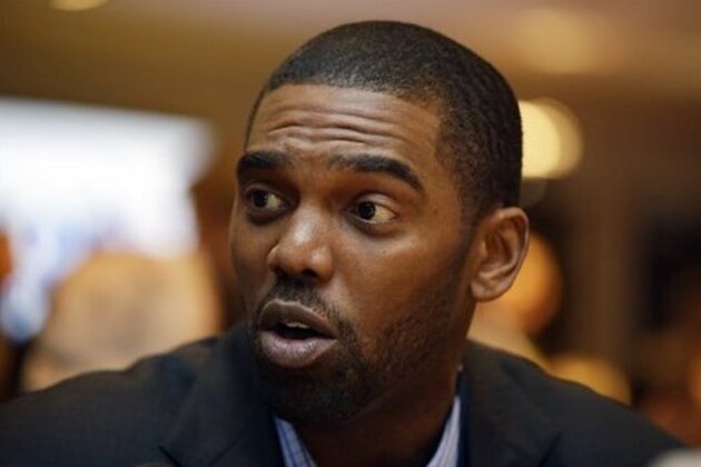 Randy Moss speaks during an interview at the NFL Super Bowl XLVIII media center, Tuesday, Jan. 28, 2014, in New York. (AP Photo/Matt Slocum)