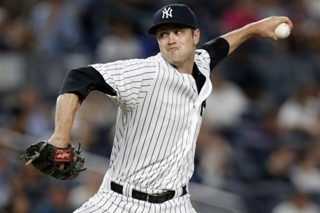 New York Yankees relief pitcher Andrew Miller  delivers during the eighth inning of a baseball game against the Los Angeles Angels at Yankee Stadium in New York, Monday, June 6, 2016. The Yankees defeated the Angels 5-2. (AP Photo/Kathy Willens)