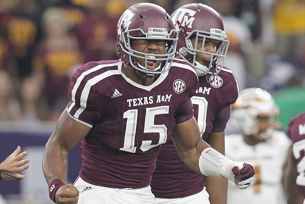 Sep 5, 2015; Houston, TX, USA;  Texas A&M Aggies defensive lineman Myles Garrett (15) celebrates his sack against Arizona State Sun Devils quarterback Mike Bercovici (2) (not pictured)in the first quarter at NRG Stadium. Mandatory Credit: Thomas B. Shea-USA TODAY Sports