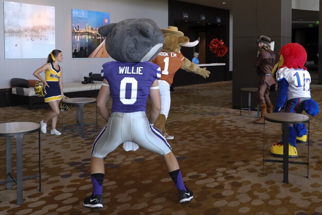 Jul 18, 2016; Dallas, TX, USA; Big 12 mascots play softball  during the Big 12 Media Days at Omni Dallas Hotel. Mandatory Credit: Kevin Jairaj-USA TODAY Sports