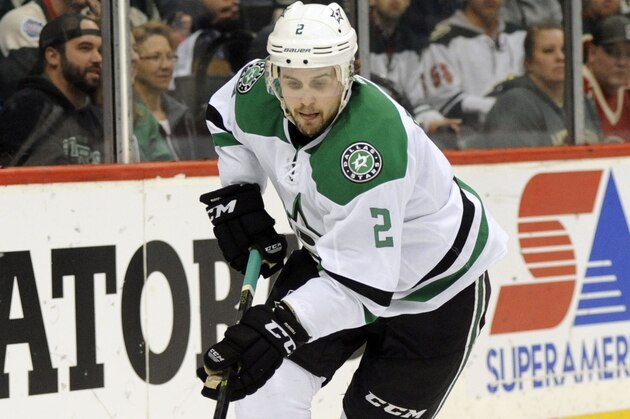 Apr 24, 2016; Saint Paul, MN, USA;  Dallas Stars defenseman Kris Russell (2) carries the puck behind the Dallas net during the second period against the Minnesota Wild in game six of the first round of the 2016 Stanley Cup Playoffs at Xcel Energy Center. Mandatory Credit: Marilyn Indahl-USA TODAY Sports