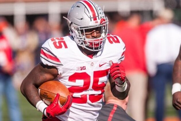 Ohio State running back Bri'onte Dunn (25) warms up before an NCAA football game against Illinois Saturday, Nov. 14, 2015 at Memorial Stadium in Champaign, Ill.  Ohio State won 28-3.  (AP Photo/Bradley Leeb)