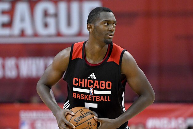 Jul 10, 2016; Las Vegas, NV, USA; Chicago Bulls forward Bobby Portis (5) looks for a teammate to pass to during an NBA Summer League game against the Philadelphia 76ers at Thomas & Mack Center. Chicago won the game 83-70. Mandatory Credit: Stephen R. Sylvanie-USA TODAY Sports Jul 10, 2016; Las Vegas, NV, USA; Chicago Bulls forward Bobby Portis (5) looks for a teammate to pass to during an NBA Summer League game against the Philadelphia 76ers at Thomas & Mack Center. Chicago won the game 83-70. Mandatory Credit: Stephen R. Sylvanie-USA TODAY Sports