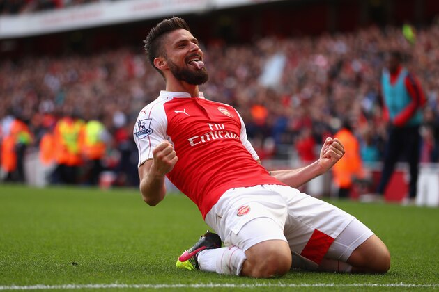 LONDON, ENGLAND - MAY 15:  Olivier Giroud of Arsenal celebrates scoring to make it 2-0 during the Barclays Premier League match between Arsenal and Aston Villa at the Emirates Stadium on May 15, 2016 in London, England.  (Photo by Julian Finney/Getty Images)