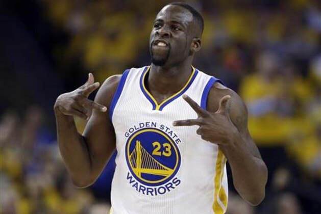 FILE - In this April 27, 2016, file photo, Golden State Warriors' Draymond Green celebrates after scoring against the Houston Rockets during the first half in Game 5 of a first-round NBA basketball playoff series, in Oakland, Calif. Green was arrested for an alleged assault over the weekend in East Lansing, Michigan, according to online court records. The incident occurred around 2:30 a.m. Sunday, July 10, 2016, in the city where Green played for Michigan State from 2008-12. (AP Photo/Marcio Jose Sanchez, File)