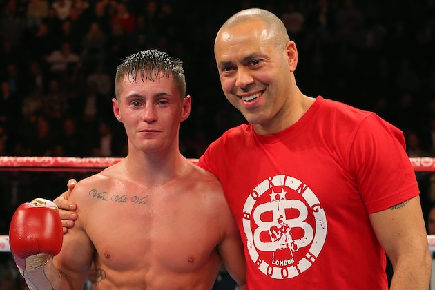 MANCHESTER, ENGLAND - NOVEMBER 21: Ryan Burnett and trainer Adam Booth following the fight against Jason Booth during their British Bantamweight  bout at the Manchester Arena on November 21, 2015 in Manchester, England. (Photo by Dave Thompson/Getty Images)