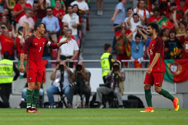 LISBON, PORTUGAL - JUNE 08:  Portugal's forward Cristiano Ronaldo celebrates scoring Portugal;s third goal with Portugal's midfielder Andre Gomes during the International Friendly match between Portugal and Estonia in preparation for Euro 2016 at Estadio da Luz on June 08, 2016 in Lisbon, Portugal.  (Photo by Carlos Rodrigues/Getty Images)