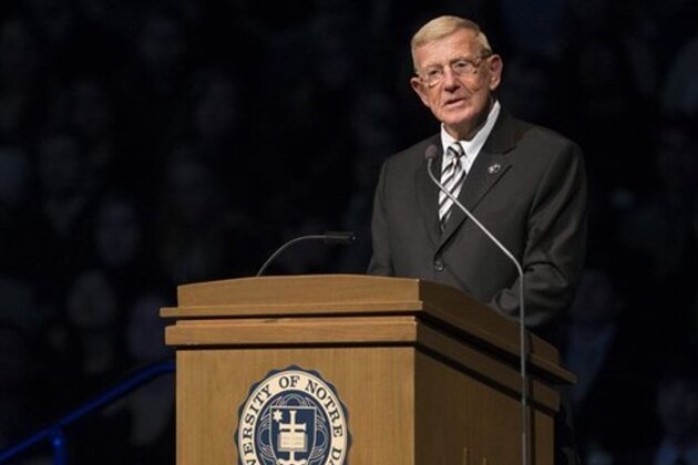 Former Notre Dame football coach Lou Holtz speaks during the memorial service for Rev. Theodore Hesburgh on Wednesday, March 4, 2015, inside the Purcell Pavilion at the University of Notre Dame in South Bend, Ind. (AP Photo/South Bend Tribune, Robert Franklin, Pool)