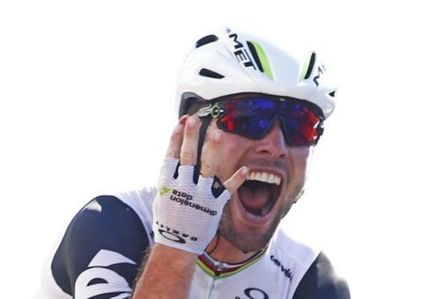 Britain's Mark Cavendish flashes four fingers for his fourth victory in this year's Tour de France as he crosses the finish line to win the fourteenth stage of the Tour de France cycling race over 208.5 kilometers (129.2 miles) with start in Montelimar and finish in Villars-les-Dombes, France, Saturday, July 16, 2016. (AP Photo/Peter Dejong)