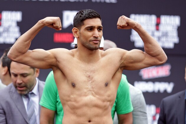 British Amir Khan poses during the weigh-in on May 6, 2016 in Las Vegas. 
Khan will fight for the WBC Middleweight title on May 7, 2016. against Mexican Saul 'Canelo' Alvarez at the T-Mobile Arena in Las Vegas.   / AFP / John Gurzinski        (Photo credit should read JOHN GURZINSKI/AFP/Getty Images)