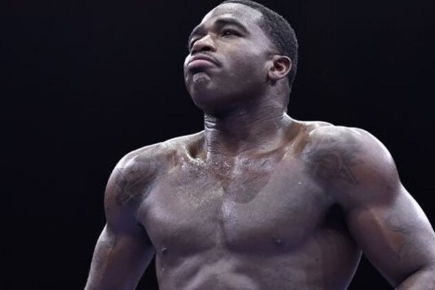 Adrien Broner walks back to his corner during his welterweight boxing bout against Shawn Porter on Saturday, June 20, 2015, in Las Vegas. Porter won by unanimous decision. (AP Photo/David Becker)