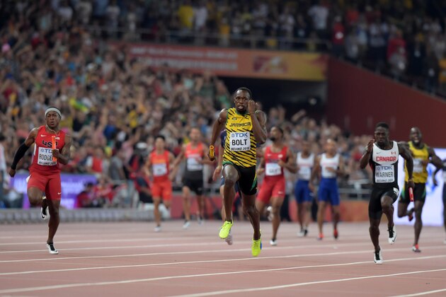 Aug 29, 2015; Beijing, China; Usain Bolt runs the anchor leg on the Jamaica 4 x 100m relay that won in 37.36 during the IAAF World Championships in Athletics at National Stadium. Mandatory Credit: Kirby Lee-USA TODAY Sports