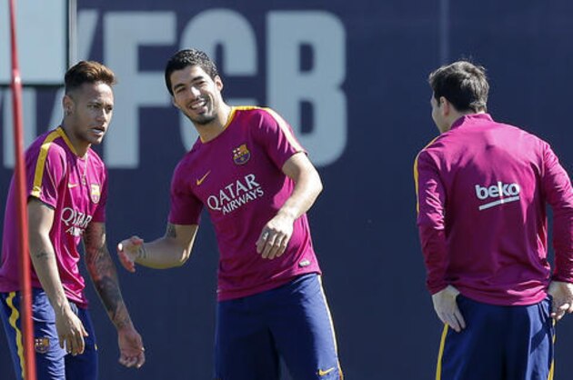 FC Barcelona's Neymar, left, Luis Suarez, centre, and Lionel Messi exercise during a training session at the Sports Center FC Barcelona Joan Gamper in Sant Joan Despi, Spain, Saturday, April 16, 2016. (AP Photo/Manu Fernandez)