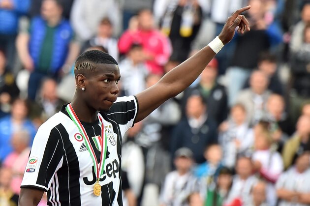 Juventus' midfielder Paul Pogba from France celebrates after the Italian Serie A football match Juventus vs Sampdoria on May 14, 2016 at the 'Juventus Stadium' in Turin. / AFP / GIUSEPPE CACACE        (Photo credit should read GIUSEPPE CACACE/AFP/Getty Images)