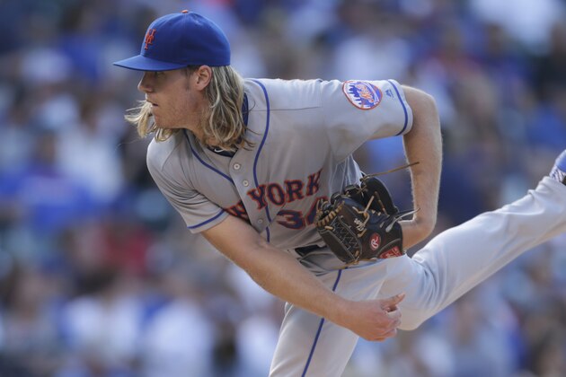 CHICAGO, IL - JULY 19: Noah Syndergaard #34 of the New York Mets pitches during the first inning against the Chicago Cubs at Wrigley Field on July 19, 2016 in Chicago, Illinois. (Photo by Mike McGinnis/Getty Images)