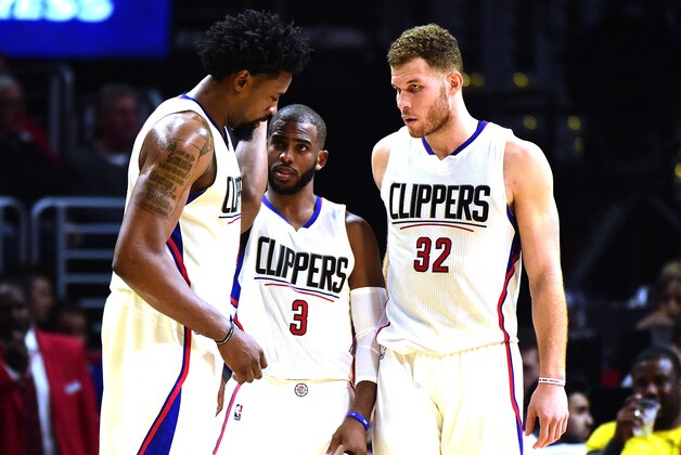LOS ANGELES, CA - DECEMBER 21:  DeAndre Jordan #6, Chris Paul #3 and Blake Griffin #32 of the Los Angeles Clippers gather during the game against the Oklahoma City Thunder at Staples Center on December 21, 2015 in Los Angeles, California.  NOTE TO USER: User expressly acknowledges and agrees that, by downloading and or using this Photograph, user is consenting to the terms and condition of the Getty Images License Agreement.  (Photo by Harry How/Getty Images)