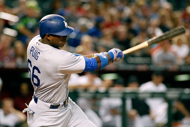 PHOENIX, AZ - JULY 15:  Yasiel Puig #66 of the Los Angeles Dodgers swings at a pitch against the Arizona Diamondbacks during the first inning of a MLB game at Chase Field on July 15, 2016 in Phoenix, Arizona.  (Photo by Ralph Freso/Getty Images)