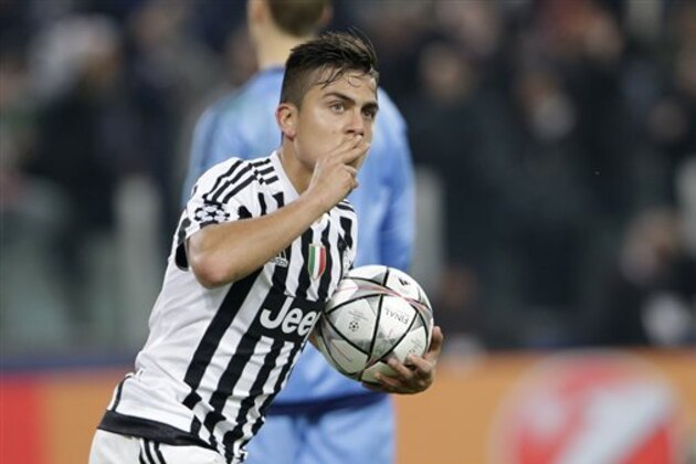 Juventus' Paulo Dybala celebrates after scoring his side's first goal during the Champions League, round of 16, first-leg soccer match between Juventus and Bayern Munich at the Juventus stadium in Turin, Italy, Tuesday, Feb. 23, 2016. (AP Photo/Luca Bruno)