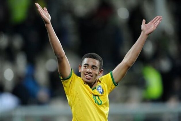 FILE - In this June 17, 2015, file photo, Brazil's Gabriel Jesus celebrates following a under-20 soccer World Cup semifinal game against Senegal in Christchurch, New Zealand. Brazil football fans are more excited with their young Olympic team than with the squad playing now at Copa America Centenario in the United States. The main reason is 19-year-old Jesus, a striker at Sao Paulo club Palmeiras, who may wind up being the star in the Olympics as Brazil shoots for its first soccer gold medal.(AP Photo/Ross Setford, File)