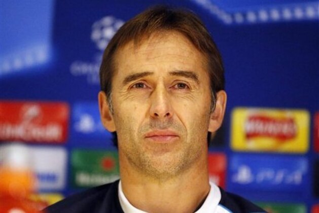 Porto's head coach Julen Lopetegui listens to journalists during a press conference one day ahead of the Champions League group G soccer match between Chelsea and FC Porto at Stamford Bridge stadium in London, Tuesday, Dec. 8, 2015. (AP Photo/Frank Augstein)