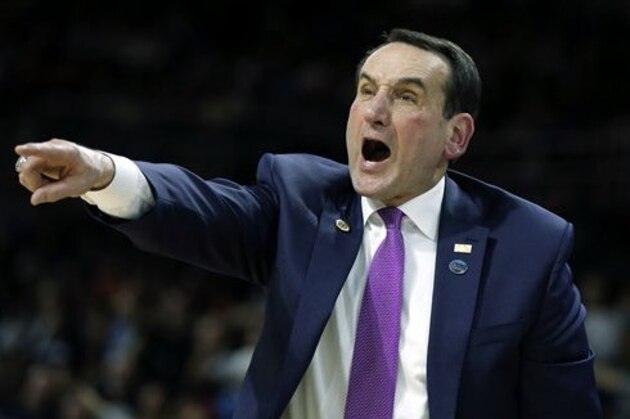 Duke head coach Mike Krzyzewski yells instructions during the second half against Yale in the second round of the NCAA men's college basketball tournament in Providence, R.I., Saturday, March 19, 2016. Duke won 71-64. (AP Photo/Michael Dwyer)