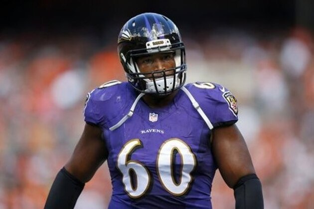Baltimore Ravens tackle Eugene Monroe (60) walks to the locker room during an NFL game at the FirstEnergy Stadium in Cleveland on Sunday, Sept. 21, 2014. (Jeff Haynes/AP Images for Panini)